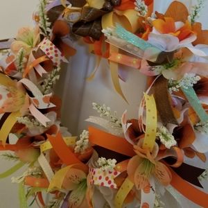 Door wreath,artificial flowers & ribbons, 12"